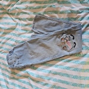 H & M skinny jeans with Unicorns on knees